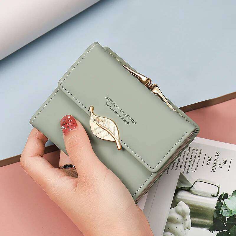 New purse Female Japan and South Korea small fresh PU solid color three fold bag multi-card folding large capacity coin student Y260206