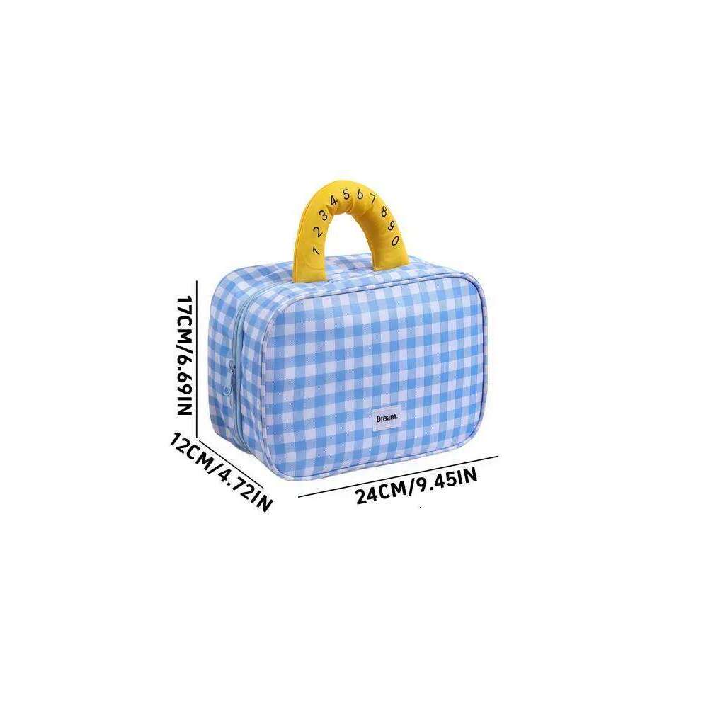 1PC Autumn and Winter travel grid storage high appearance level outdoor makeup bag large capacity portable cosmetics Y260206