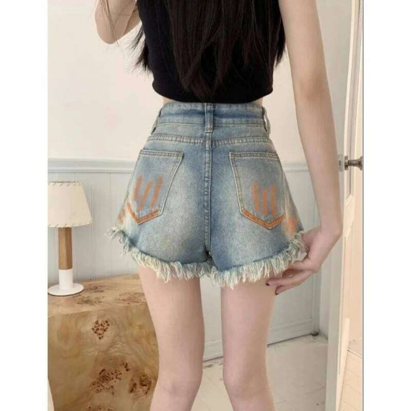 Women's painted graffiti denim shorts for summer, thin, high waisted, A-line with fringed edges, slim and wide leg pants, trendy XJ260206