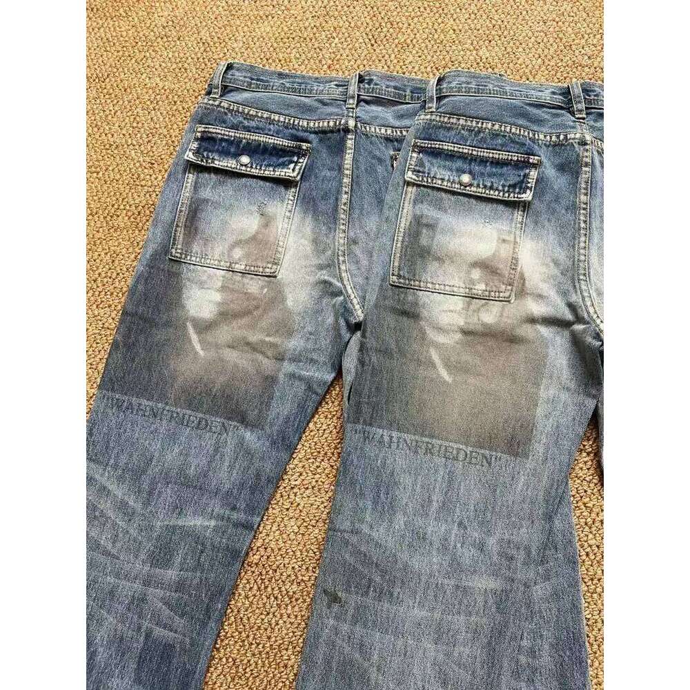 Undercover Multi Personality Face Portrait Print Jeans Men Women Unisex Washed Distressed Hole Damaged Burr Micro Flared Pants 26L0507