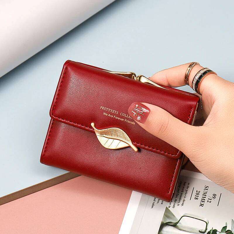 New purse Female Japan and South Korea small fresh PU solid color three fold bag multi-card folding large capacity coin student Y260206