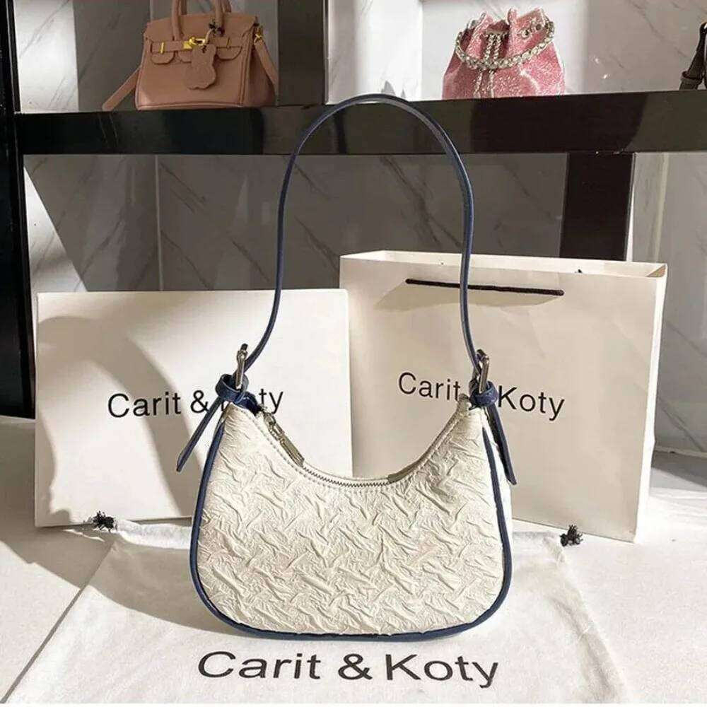 Original advanced sense this year's popular pleated female summer niche design crescent underarm bag shoulder Y260205