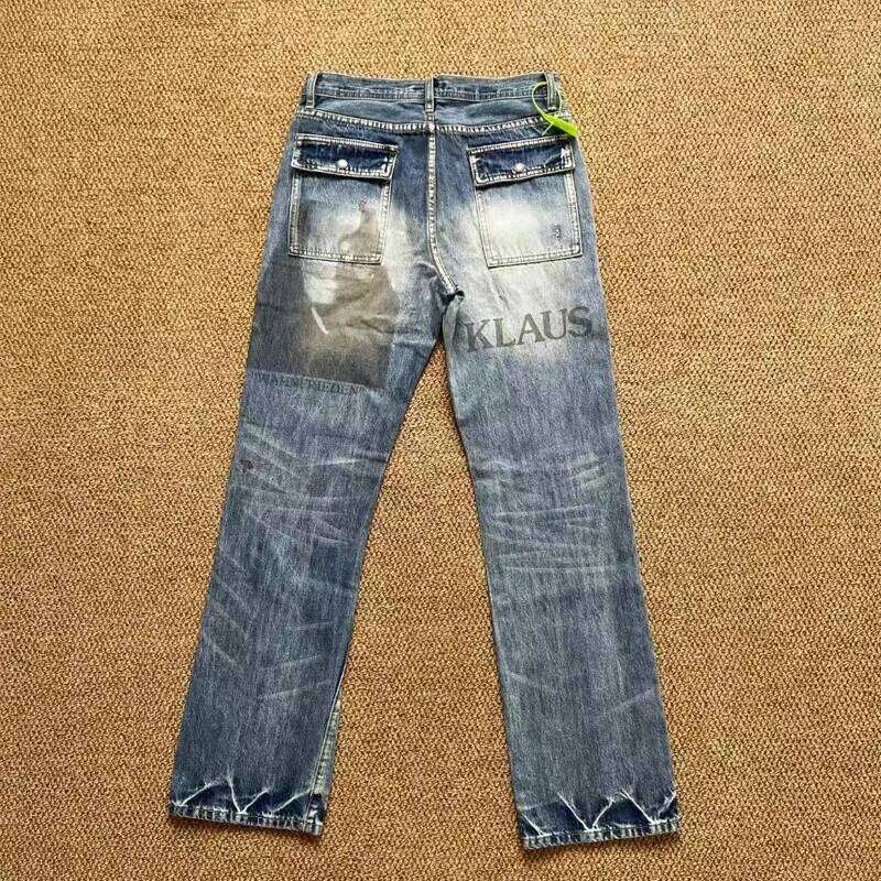 Undercover Multi Personality Face Portrait Print Jeans Men Women Unisex Washed Distressed Hole Damaged Burr Micro Flared Pants 26L0507