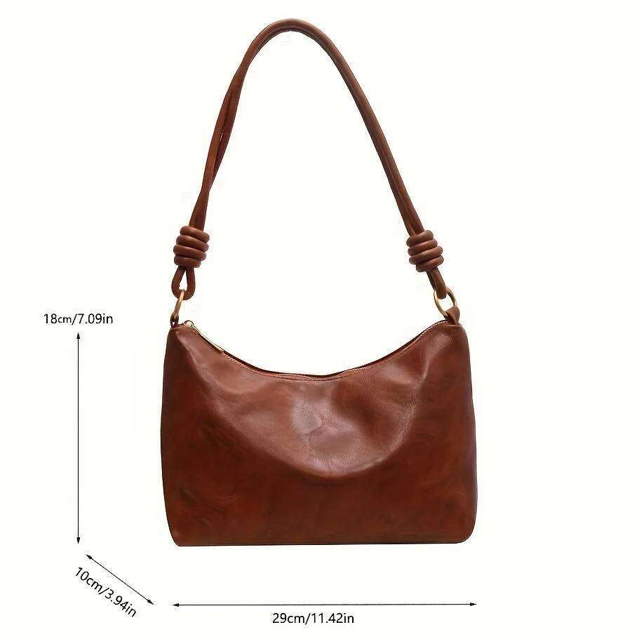 The new fashionable and high-end womens soft-touch shoulder bag is a geometric wide-band cross-body commuting handbag. Y260204