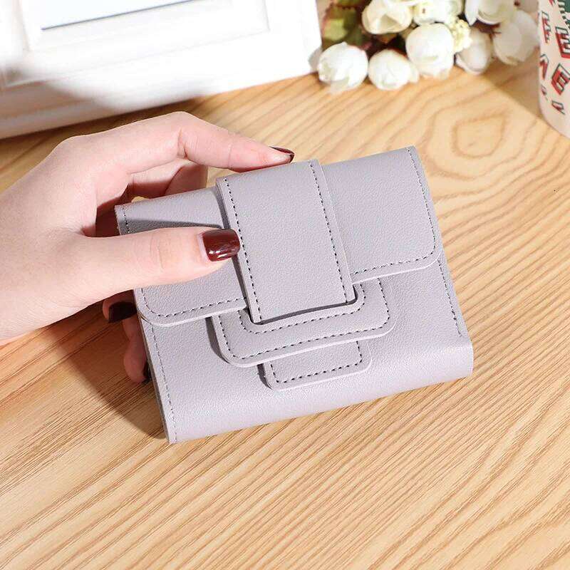 New Korean version of solid color belt ladies female coin purse clutch bag student short wallet Y260206