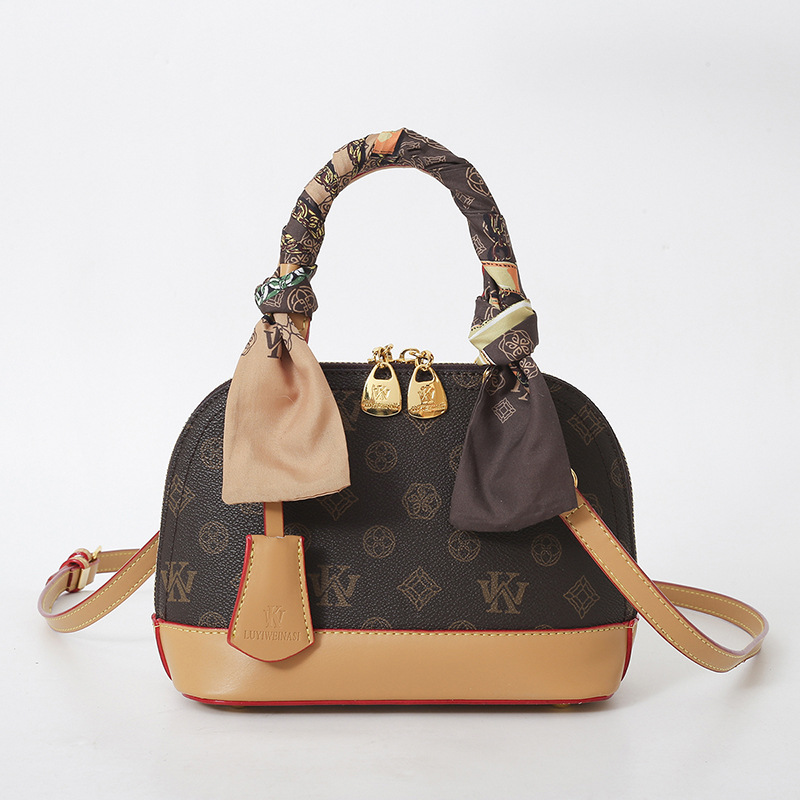 LUYIWEINASI Premium sense portable pillow bag women's 2025 new retro printed women's cylinder bag shoulder bag oblique span bag tide