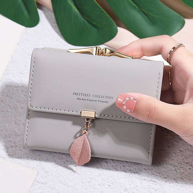 2024 summer Explosion-style women's short wallet Korean PU leather simple everything with solid color personality leaf pendant b Y260206