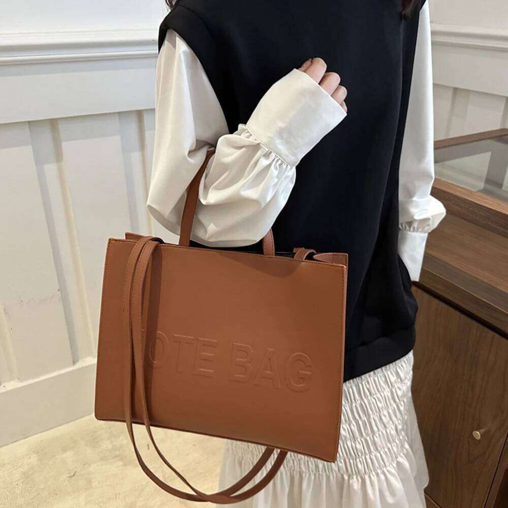 2024 new large capacity simple single shoulder crossbody texture handbag letter indentation class commuting tote bag Z260207