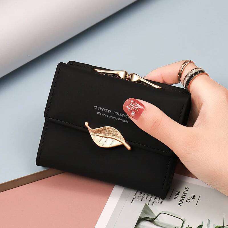 New purse Female Japan and South Korea small fresh PU solid color three fold bag multi-card folding large capacity coin student Y260206