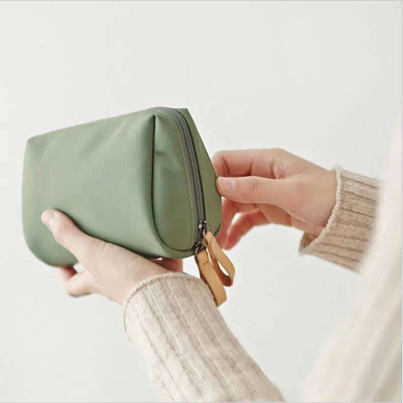 New Korean version red envelope women's casual large capacity waterproof wash and makeup travel niche portable small bag Y260206