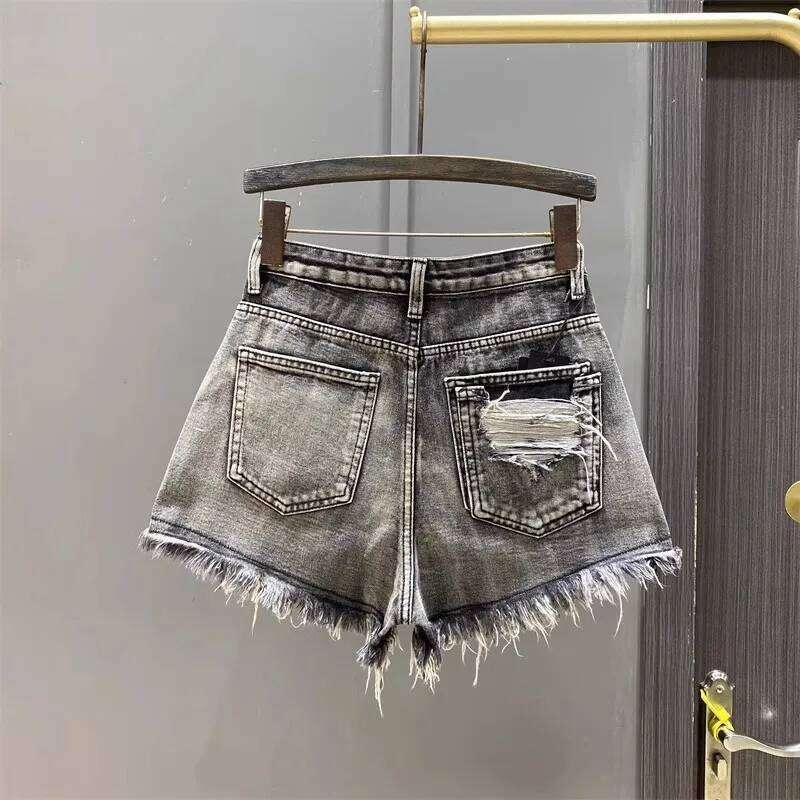 Worn Legs with Rough Edges Washed Black 2026 Summer New Women Fashion A-line Wide Leg Hole Ripped Denim Shorts XJ260206