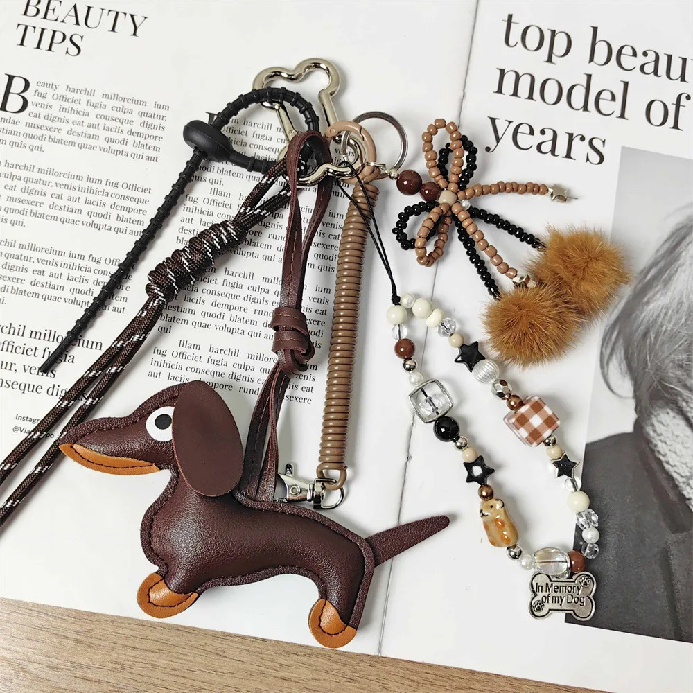 Handmade baseball personality keychain Creative simple soda bread fringe trend accessories Dachshund dog bow hairball bag pendan 260107