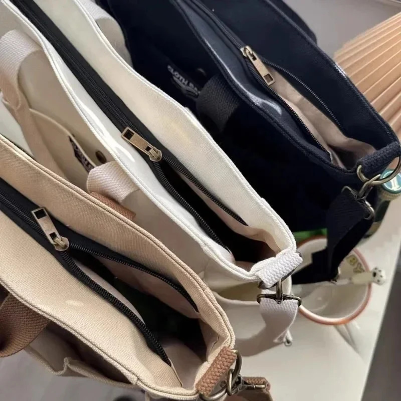Urban Minimalist Female Student Large Capacity Commuting Horizontal Canvas Single Shoulder Diagonal Cross Portable Tote Bag260128