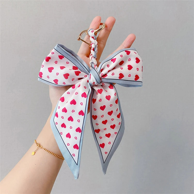 Camellia Silk Keychain for Women Ribbon Bow Pendant with Ring Bag Car Key Chain Hangings Elegant Handbag Accessory Gift 260130