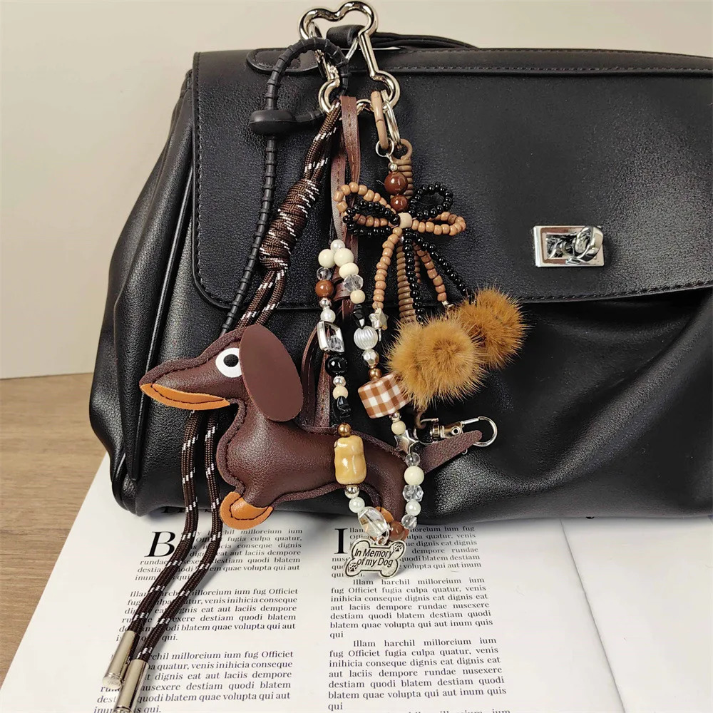 Handmade baseball personality keychain Creative simple soda bread fringe trend accessories Dachshund dog bow hairball bag pendan 260107