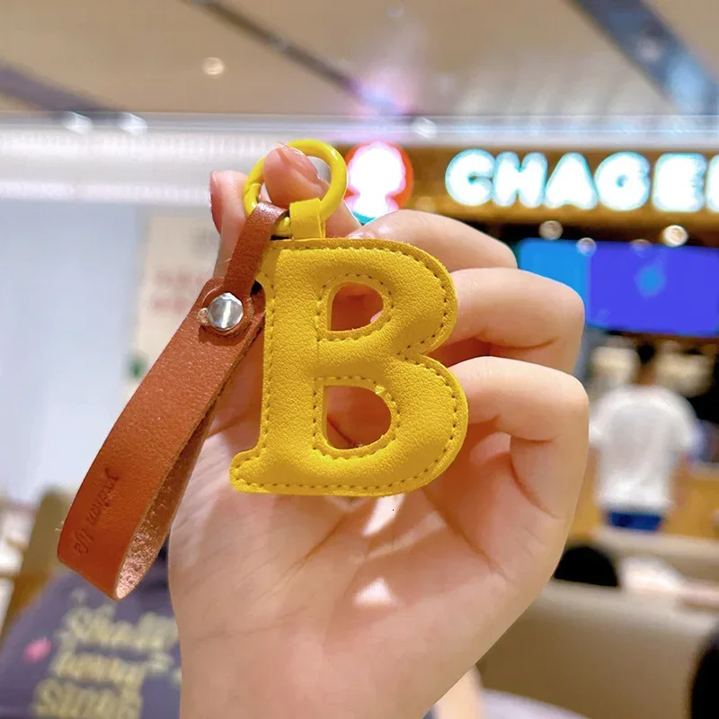 Creative Leather English Letter Keychain Bag Hanging Ornaments Pendant Charms Decorations for Bag Phone Bag Accessories Gift 260130