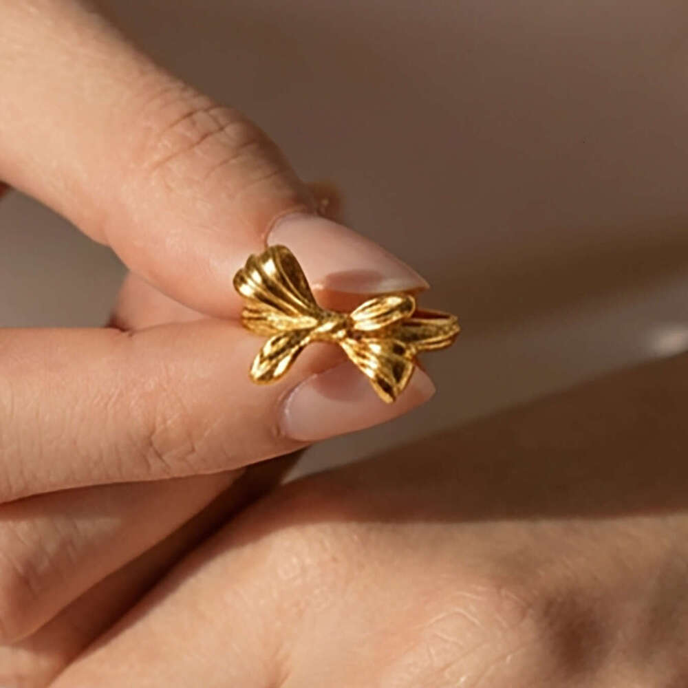 Bowknot open stainless steel vacuum electroplated 18K gold European and American ins niche index finger ring jewelry wholesale