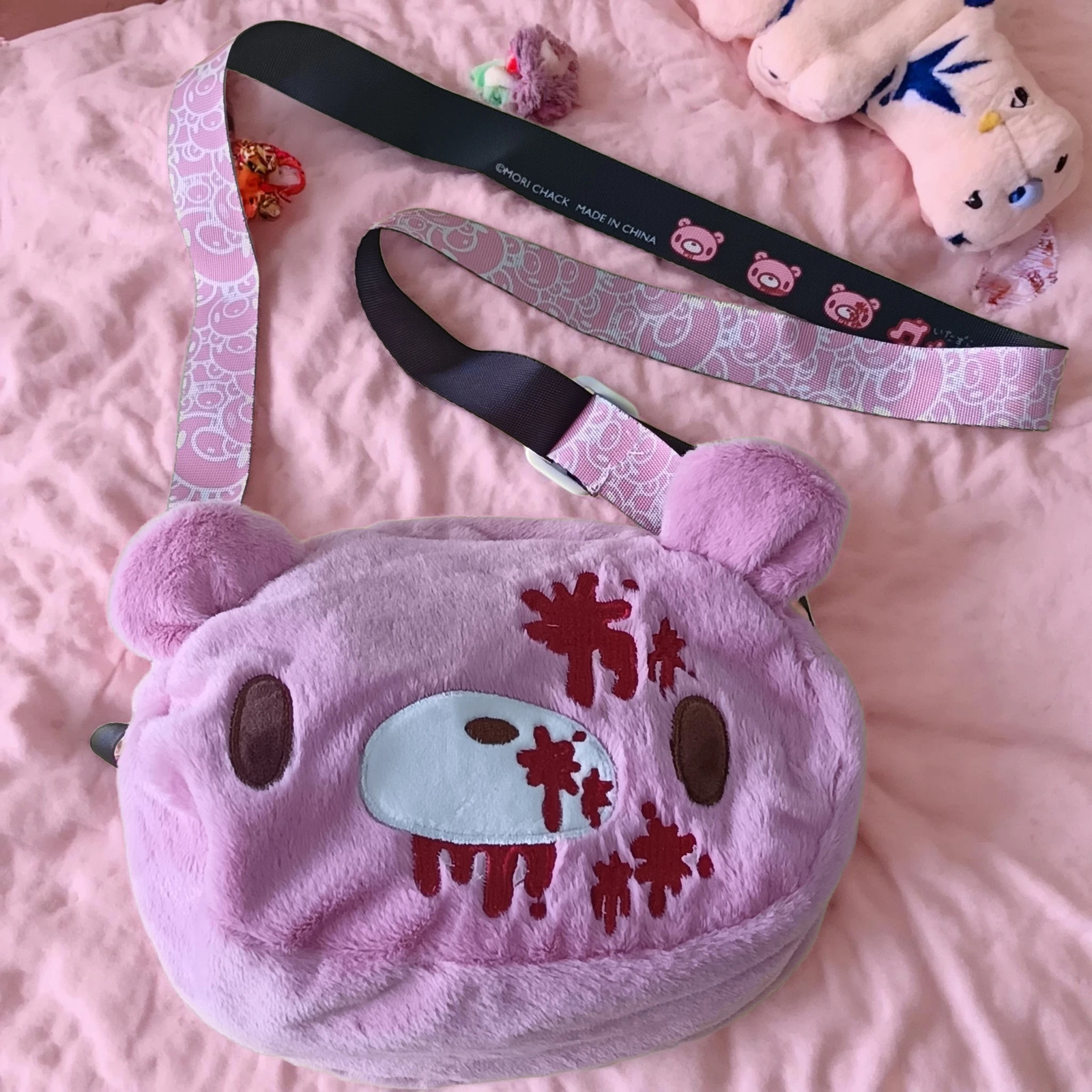 Gloomy Bear plush crossbody bag Pink cute edgy with blood splatter details A fun unique pick for fans 260208