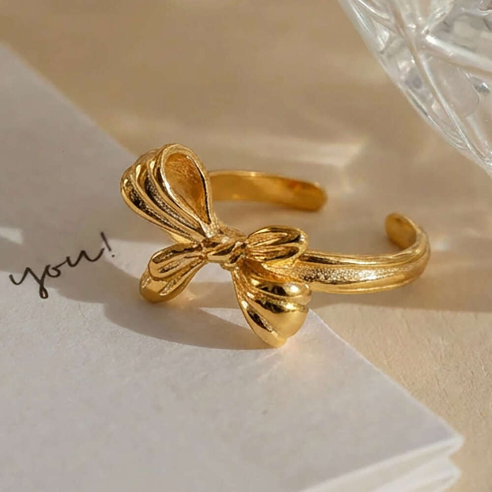 Bowknot open stainless steel vacuum electroplated 18K gold European and American ins niche index finger ring jewelry wholesale