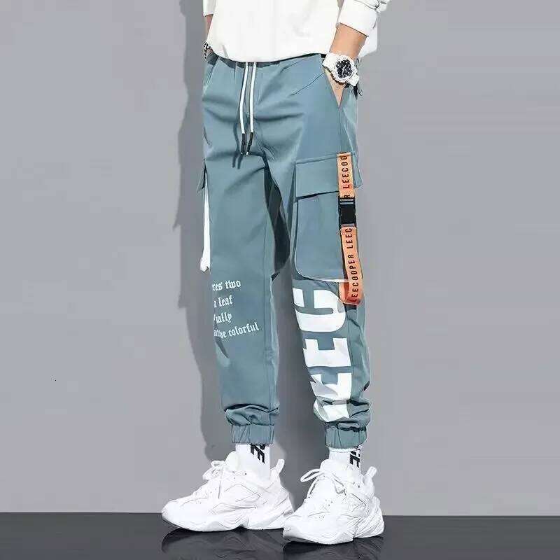 Classic Streetwear Casual Men Ribbons Harem Jogging Male Slim Fit Spring Cargo Pants Multi-Pockets Women Trouser