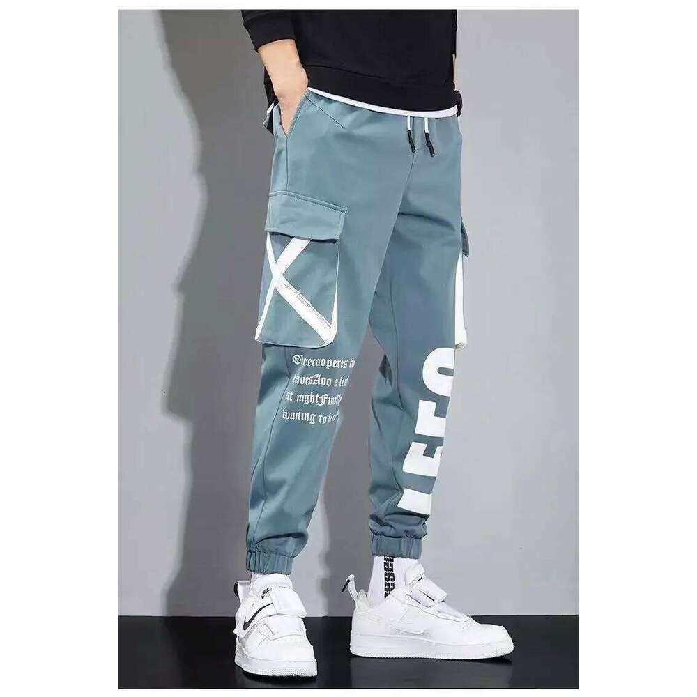 Classic Streetwear Casual Men Ribbons Harem Jogging Male Slim Fit Spring Cargo Pants Multi-Pockets Women Trouser
