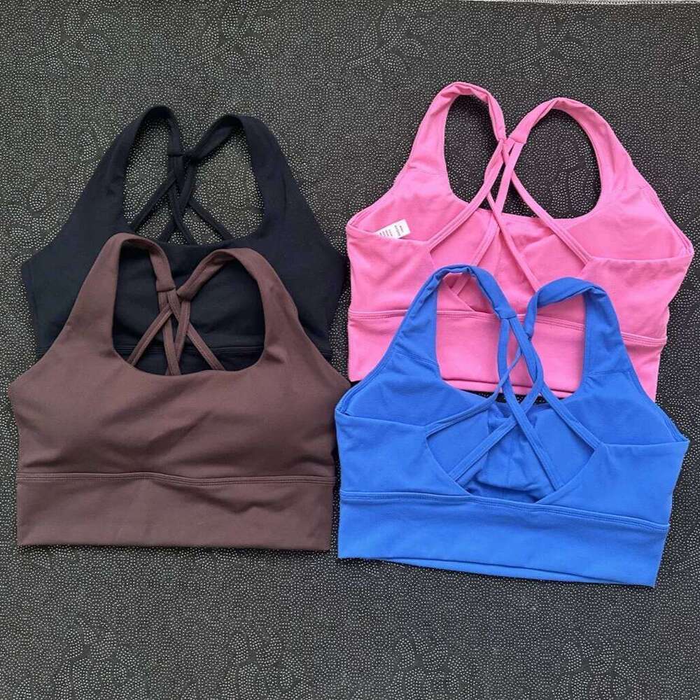 Solid Color Butter Cross Gym Yoga Underwear Women Hollow shoulder straps Fitness sport Bra Top Comprehensive Training pad 26Y0209