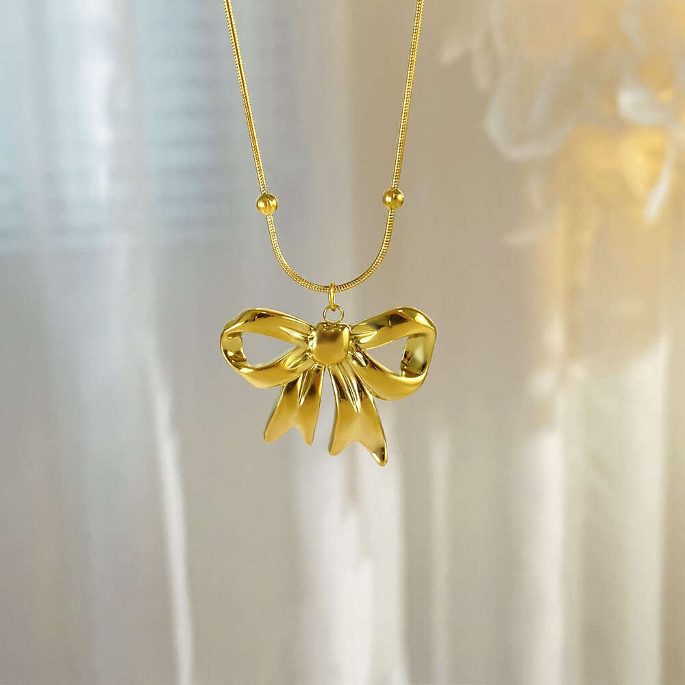 18K real gold electroplated titanium steel necklace light luxury personalized and versatile bow clavicle chain