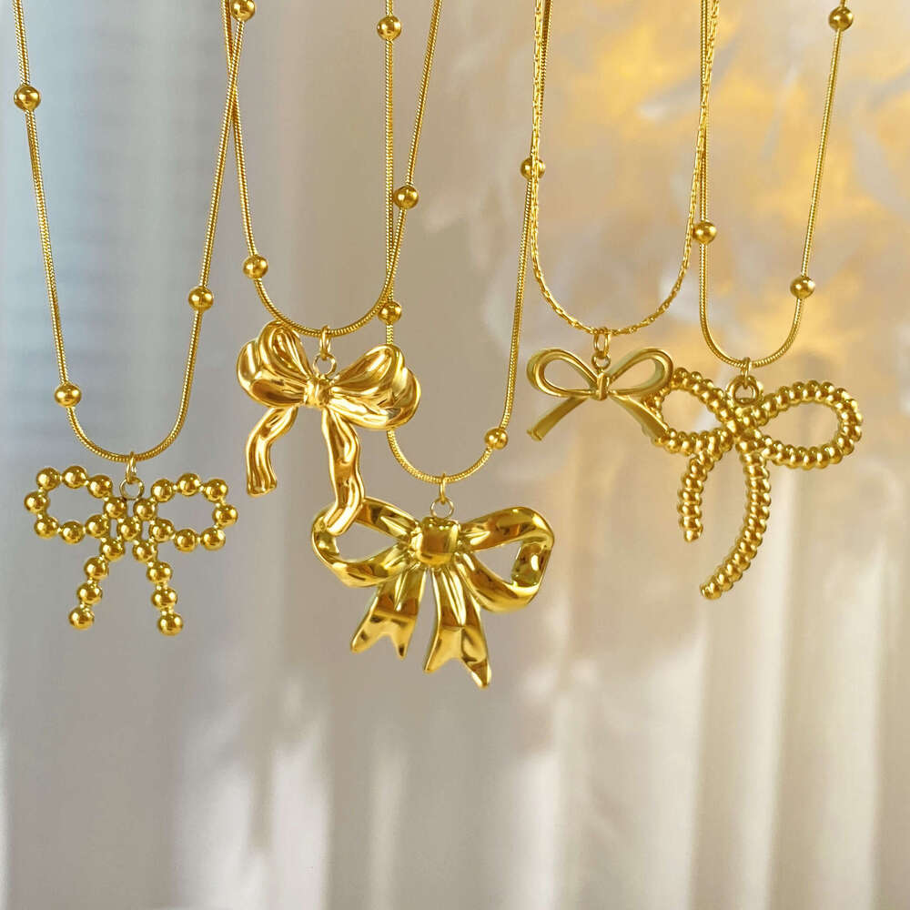18K real gold electroplated titanium steel necklace light luxury personalized and versatile bow clavicle chain