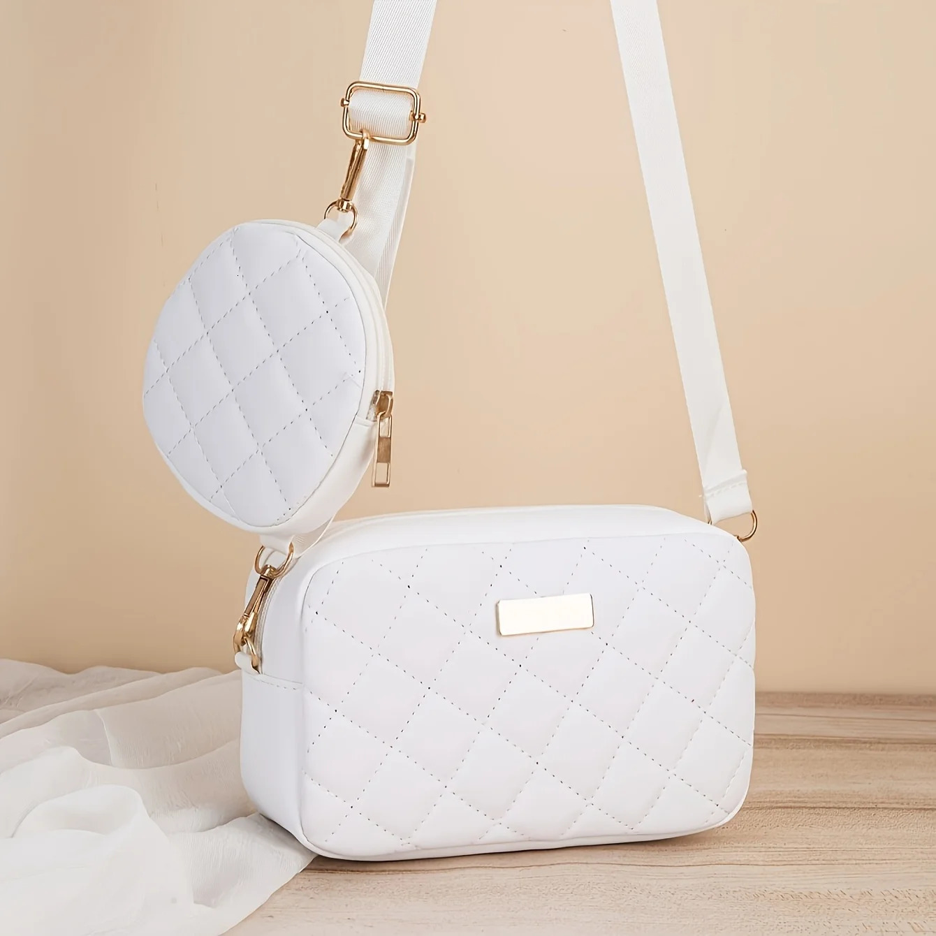 A fashionable crossbody bag set for women featuring a coin purse embroidery n adjustable shoulder strap and zipper openi 260208