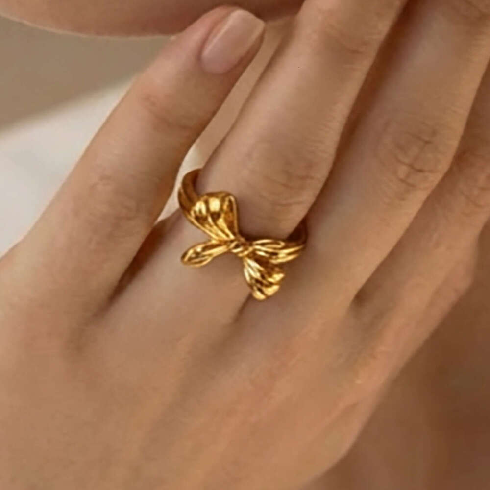 Bowknot open stainless steel vacuum electroplated 18K gold European and American ins niche index finger ring jewelry wholesale