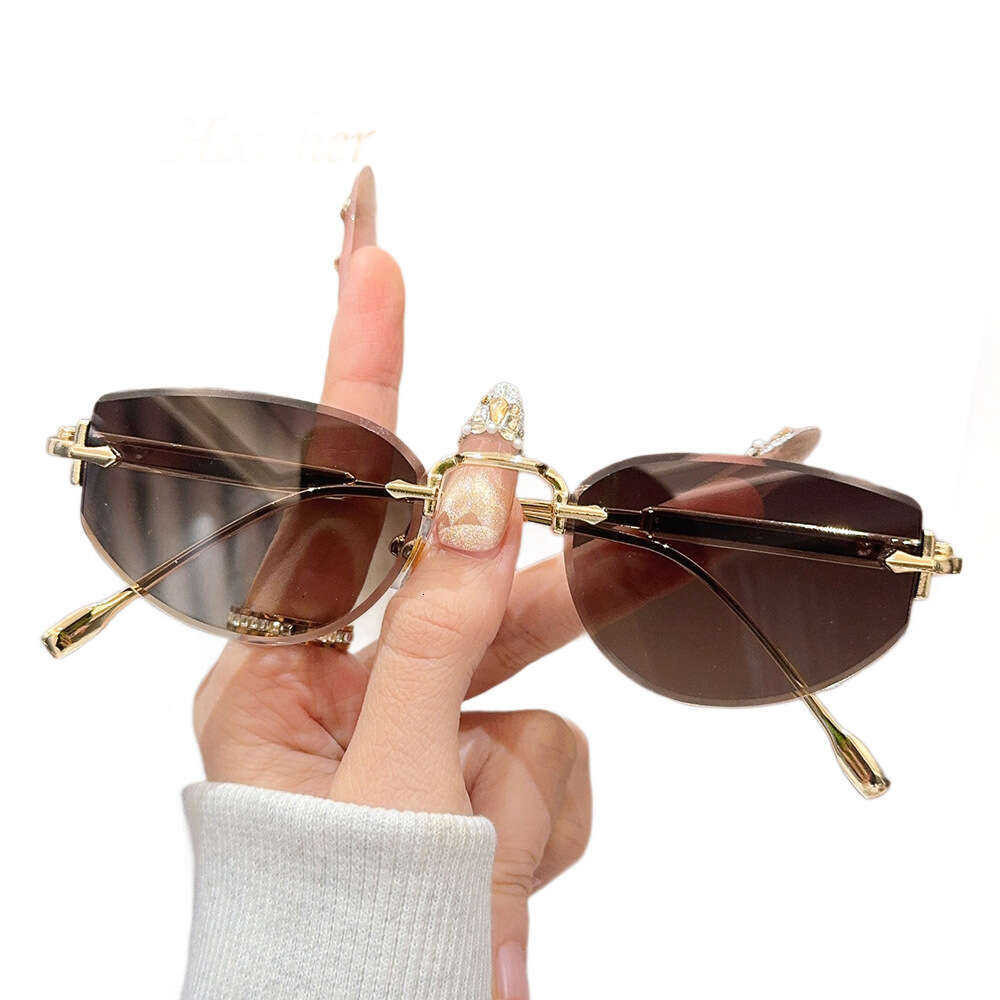 New Frameless for Women 2505 Fashionable High-End European and American Retro Cat-Eye Metal Sunglasses