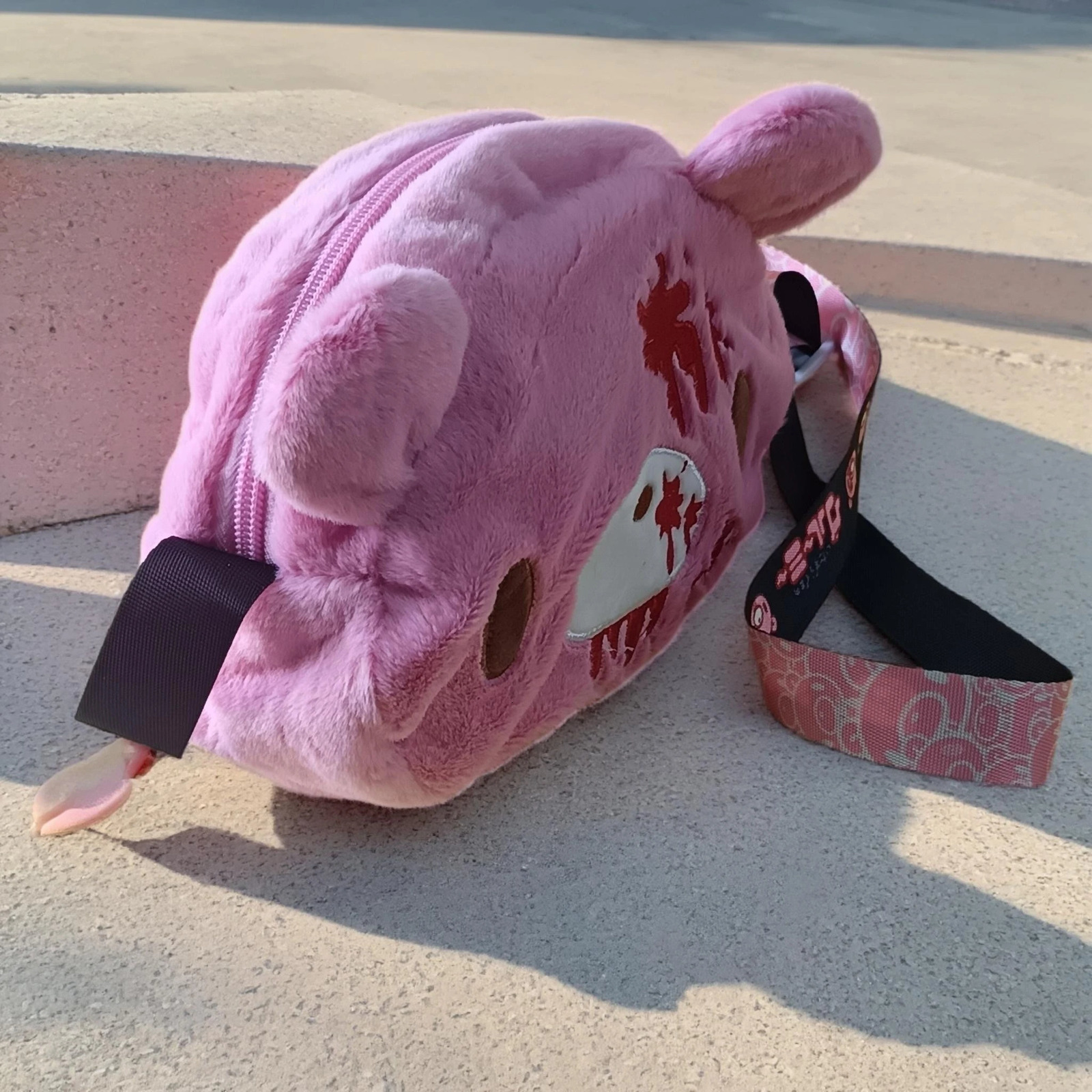 Gloomy Bear plush crossbody bag Pink cute edgy with blood splatter details A fun unique pick for fans 260208