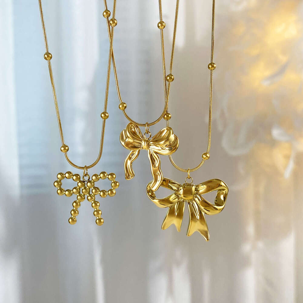 18K real gold electroplated titanium steel necklace light luxury personalized and versatile bow clavicle chain