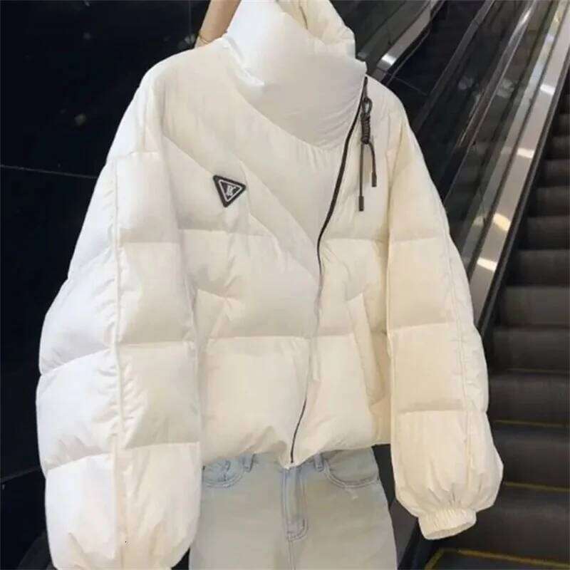 Women's Thick Stand Collar Coat Winter New Korean Version Personalized Designer Fashion Irregular Cotton Jacket Design Sense Loose Short Top