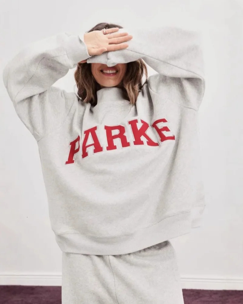 Womens casual sportswear Y2K street daily solid Harajuku long sleeved shirt oversized round neck top womens loose jacket jacke 260126