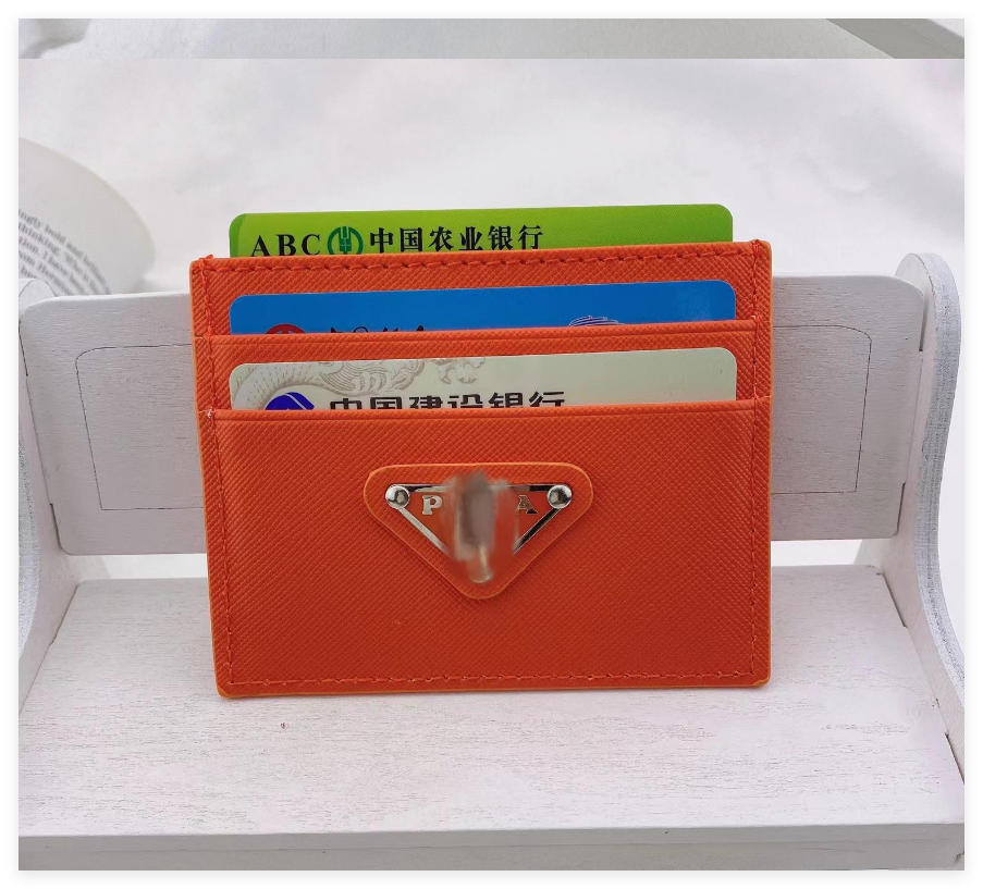 2025 Designer Women's Mens Re-Edition triangle card holder Purses wallets Luxurys vintage wallet Leather with box branded retro wholesale Holders Coin card Key