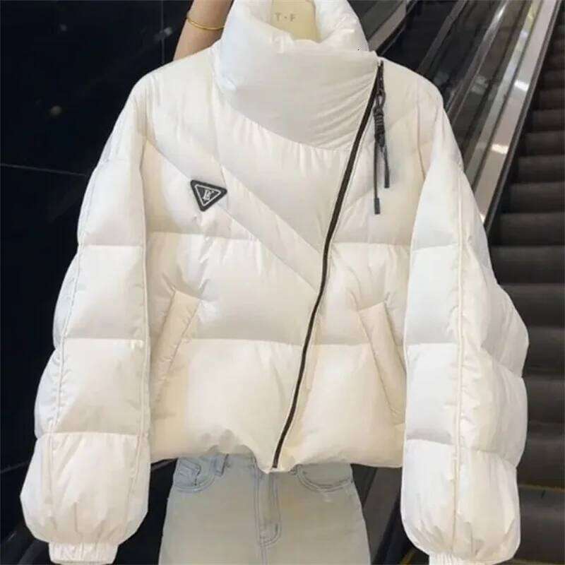 Women's Thick Stand Collar Coat Winter New Korean Version Personalized Designer Fashion Irregular Cotton Jacket Design Sense Loose Short Top