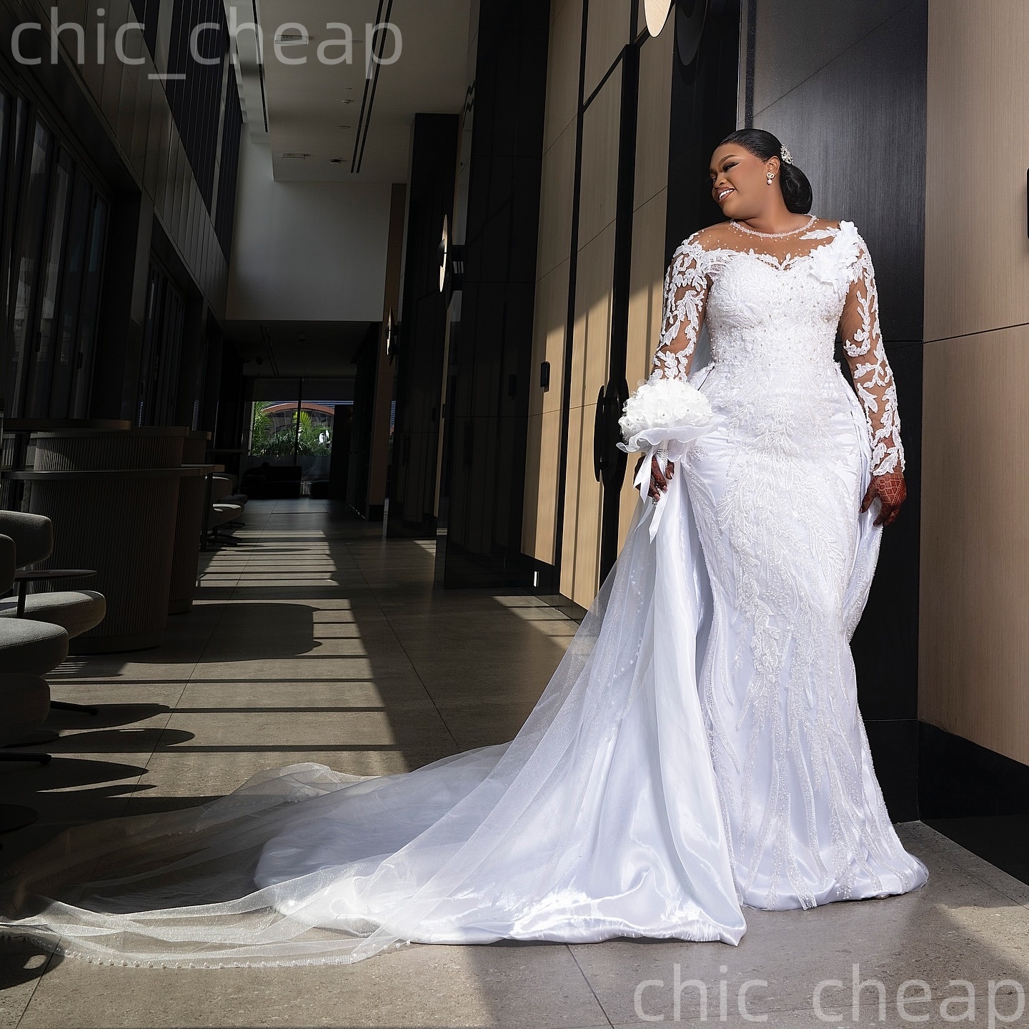 African Aso Ebi 2026 Ivory Breathtaking Mermaid Wedding Dress Flowers Beaded Crystals Lace Full Sleeves Transmative Train Charming Bridal Gowns Dresse