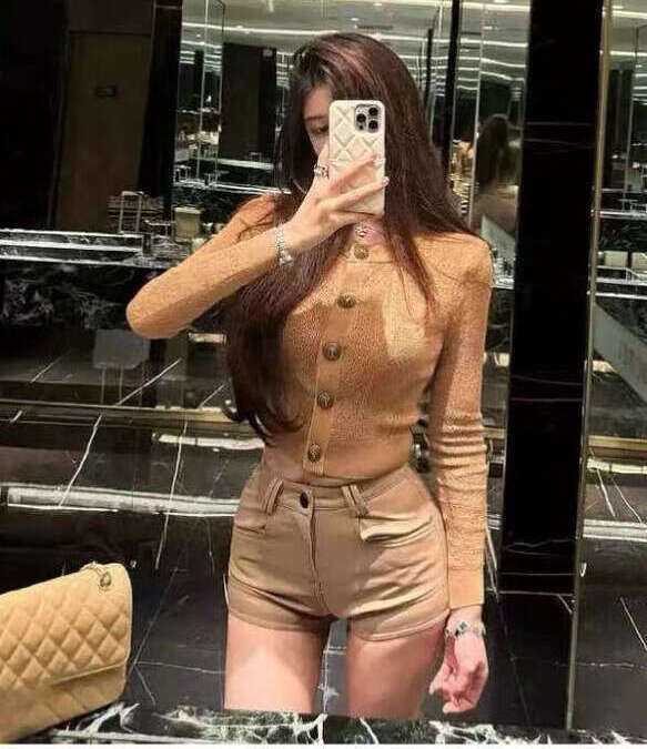 Designer style metal buckle hollow knit women's cardigan 2026 autumn new slim fit high-end jacket