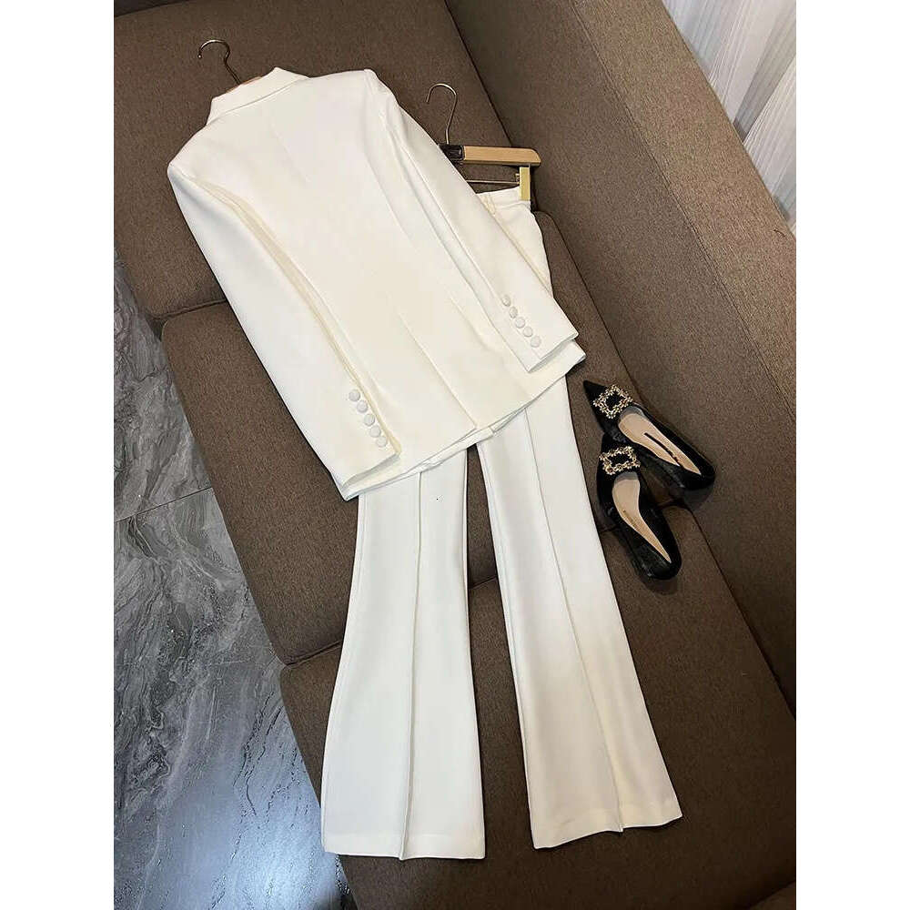 Autumn white and black solid color two-piece long sleeved split single button sports jacket top high waisted flared pants long pants set