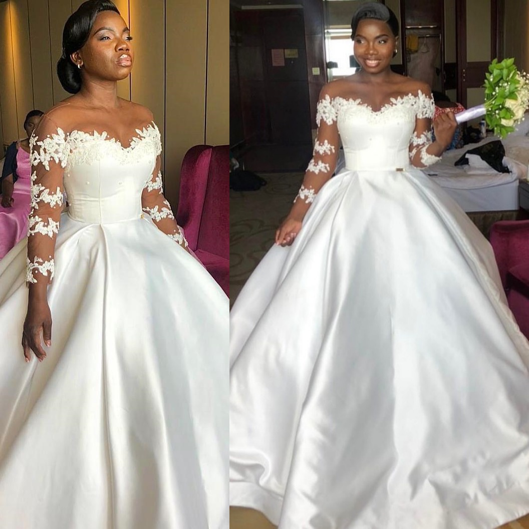 African Aso Ebi 2026 Ivory Ball Gown Wedding Dress Appliques Pearls Sheer Neck Full Sleeves Satin Elegant Bridal Gowns Dresses ZJ2334