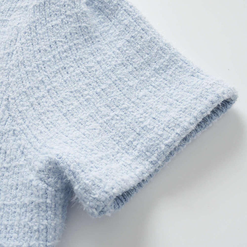 2026 autumn new elegant social exquisite style rhinestone buckle design feeling hazy blue knitted short skirt