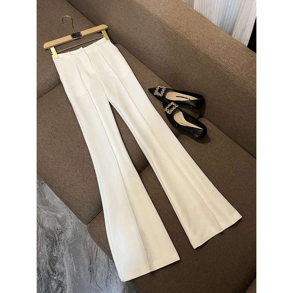 Autumn white and black solid color two-piece long sleeved split single button sports jacket top high waisted flared pants long pants set