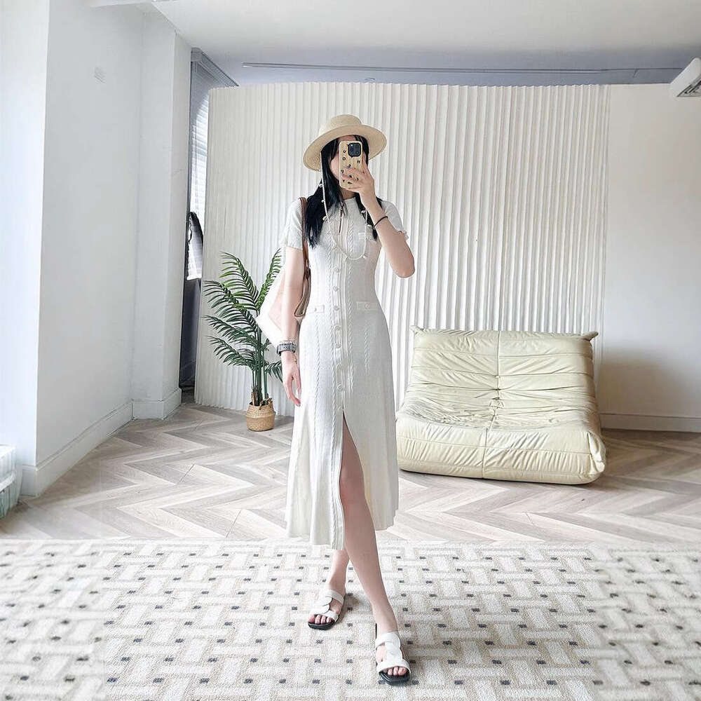 2026 autumn new women's French hollow short sleeved pleated knitted slim fit split dress