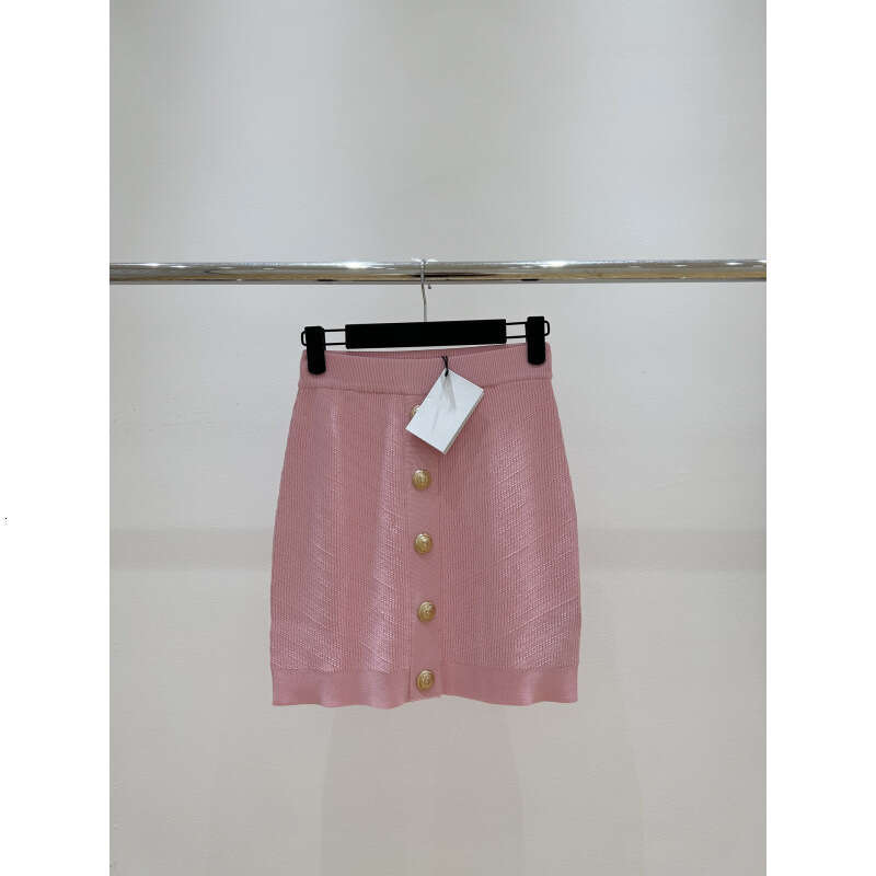 2026 New Designer's Top 100 Round Neck Pattern Knitted Long Sleeve Top with Metal Buckle Skirt