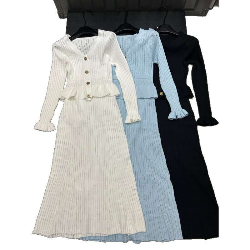 2026 autumn and winter new hollow knitted long sleeved single breasted cardigan loose multi-functional two-piece skirt for women