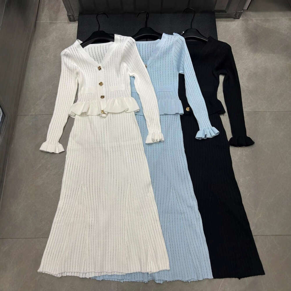 2026 autumn and winter new hollow knitted long sleeved single breasted cardigan loose multi-functional two-piece skirt for women