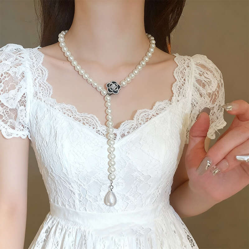 Necklace for Women Long Camellia Pearl High End Versatile Sweater Chain Fashion Clothing Accessory Pendant for Daily Wear and Gift Giving