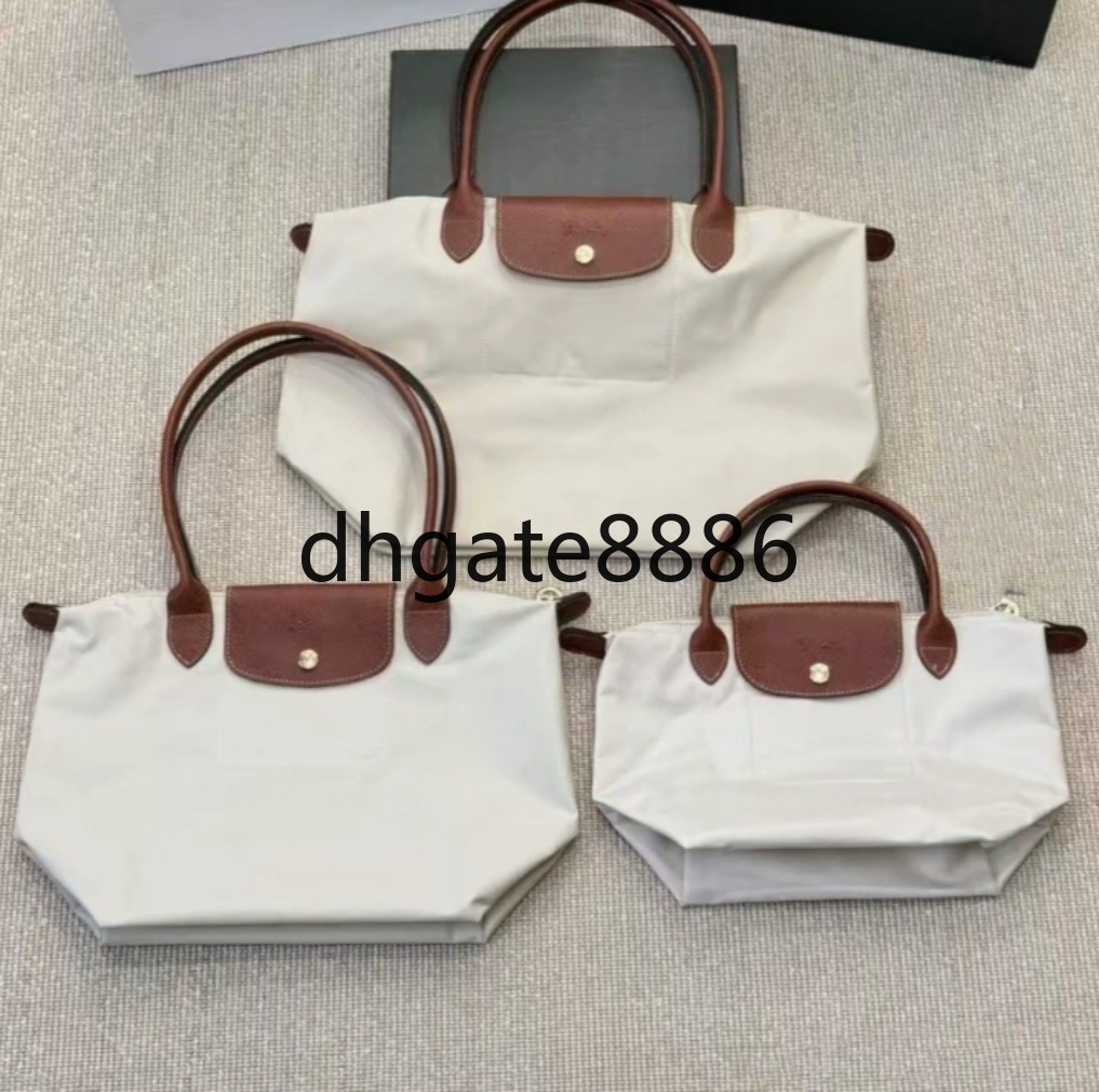 Fashionable large Womens Large-capacity large hand-held tote bag single-shoulder dumpling bag folding bag nylon underarm women's bag