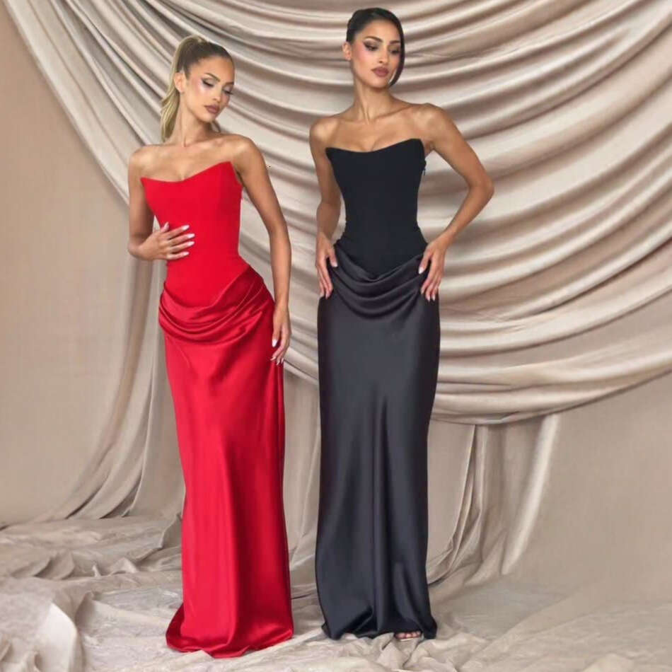 Spring 2026 Women's Collection: Seductive fishbone strapless dress with a cinched waist, adorned with ribbons and a satin pencil skirt.